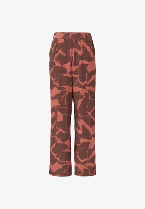 Pantalons larges en tissu brun-rouge, avec un motif abstrait de formes audacieuses et irrégulières, et une ceinture élastique confortable.