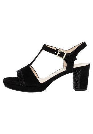 Sandale femme en daim noir à talon bloc, bout ouvert, design à bride en T et fermeture à boucle dorée sur la bride de cheville.