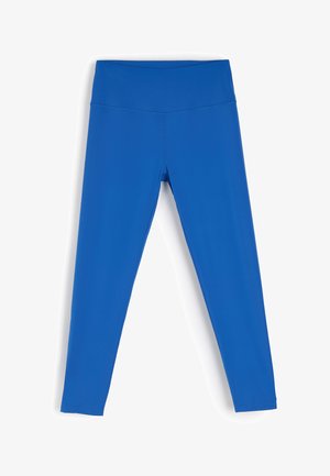 Niebieskie legginsy wykonane z elastycznego materiału, posiadające wysoki stan i gładką fakturę, zwężające się do długości kostek bez dodatkowych akcentów.
