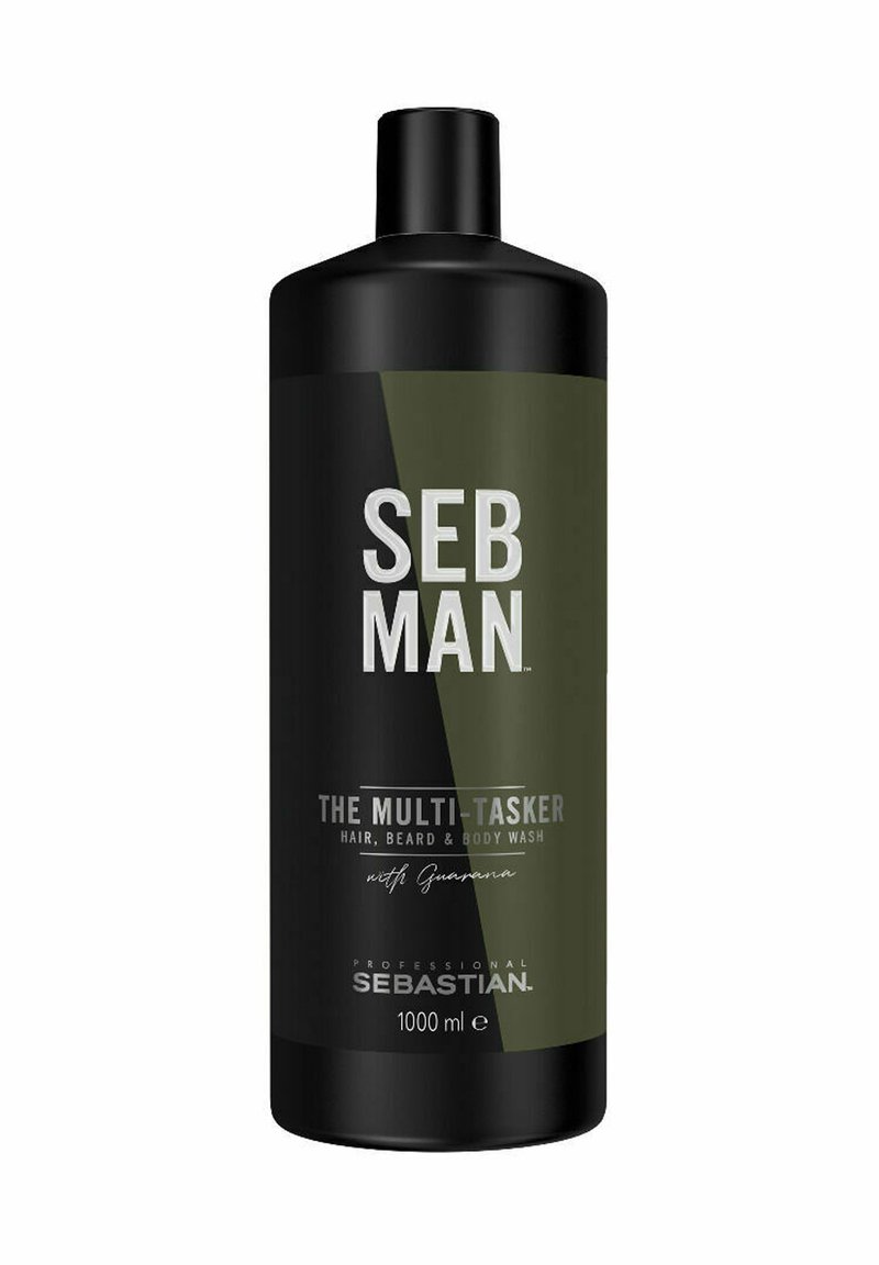 Zwarte cilindervormige fles met groene accenten, gelabeld "SEB MAN THE MULTI-TASKER," bevat 1000 ml haar-, baard- en lichaamswas.