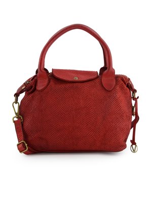 Red handbag made of textured leather with a zippered top, dual handle, and detachable strap. Features gold hardware and rounded shape.