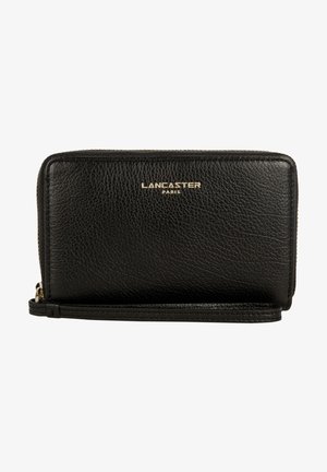 Black leather wallet with a textured surface, gold "LANCASTER PARIS" logo, zip closure, and wrist strap, featuring a rectangular shape.