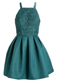 Teal klänning med en spetstopp som har blommönster, tunna band och en plisserad satinskjorta. Slät textur, figursydd topp med utsvängd nederdel.