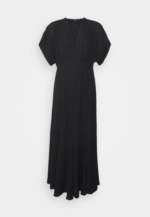 Mustapitu maxi-mekko, joka on valmistettu kevyestä kankaasta. Mekossa on syvä V-neck, lyhyet dolman-hihat ja virtaava hame, jossa on hienoinen levennys.