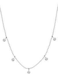 Zilveren ketting met vijf kleine, ronde, heldere kristallen hangers die gelijkmatig over de lengte zijn verdeeld. Eenvoudig, elegant ontwerp.