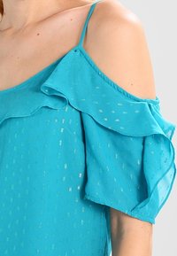 NAF NAF Blůza - turquoise