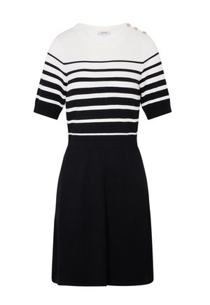 Kortærmet kjole med hvide og sorte vandrette striber på toppen, sort nederdel og tre guldknapper på venstre skulder.