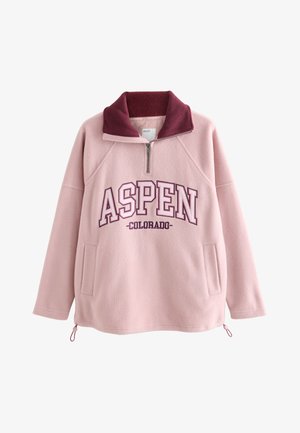 Jasnoróżowy polarowy sweter z bordowym kołnierzem, półzamkiem, przednimi kieszeniami oraz "ASPEN COLORADO" nadrukowanym dużymi literami na piersi.