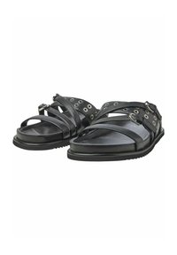 Svarta lädersandaler med breda remmar som har metallöglor och spännen. Platt sula med strukturerat mönster för bra grepp. Öppen tå-design.
