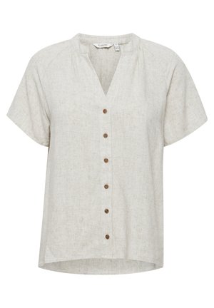 Blusa beige chiaro a maniche corte con scollatura a V, dotata di chiusura a bottoni frontale con bottoni marroni e un tessuto leggermente texturizzato.