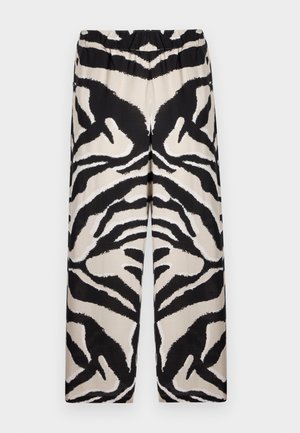 Zwarte en beige gestreepte wijde broek met een elastische tailleband, uitgerust met een gedurfde zebra-strik patroon in een zachte stof.