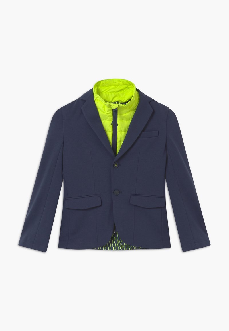 Marineblazer mit zwei Vorderaschen, Ein-Knopf-Verschluss und einem hellgrünen, gesteppten Innenfutter mit geometrischem Muster.