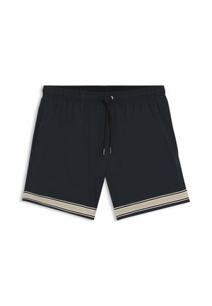 Schwarze Badeshorts mit elastischem Bund, schwarzem Kordelzug, seitlichen Taschen und beige-weißen Doppelstreifen an den Beinabschlüssen.