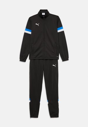 INDIVIDUALRISE TRACKSUIT UNISEX SET - Pantalones deportivos - black/white/ultra blue