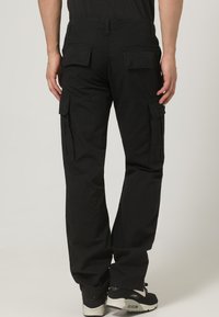 Urban Classics CAMOUFLAGE CARGO PANTS - Cargo trousers - black