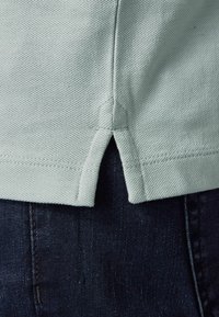 Next Polo - blue ice
