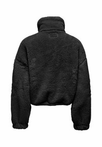 Veste courte en polaire noire avec col montant. Tissu doux et texturé avec poignets élastiqués. Détail d'un petit logo dans le dos.