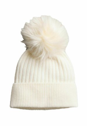 Ribbed knit white beanie with a fluffy pom-pom on top. The fabric appears soft and warm, ideal for cold weather wear.