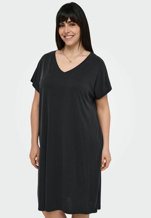 Musta, lyhythihainen mekko V-pääntiellä, pehmeä tekstuuri, rento leikkaus ja polvipituinen helma. Minimalistinen tyyli, sopii arkikäyttöön.