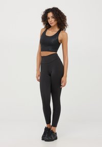 Terranova CON DETTAGLI MACULATI LUCCICANTI - Leggings - nero