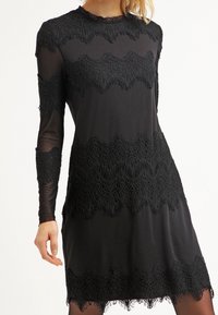 Cream Jerseyklänning - black