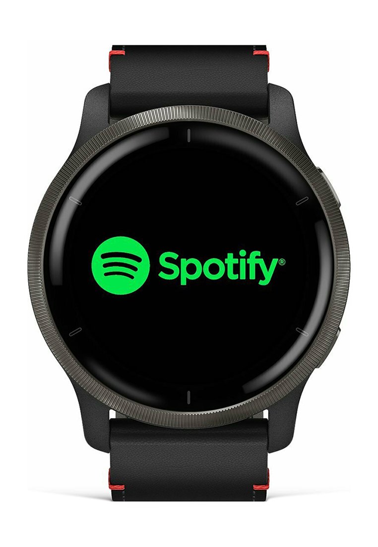 Schwarze Smartwatch mit rundem Zifferblatt, das das grüne Spotify-Logo auf schwarzem Hintergrund anzeigt, mit einem strukturierten Armband mit roten Akzenten.