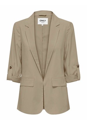 Blazer beige pour femme avec manches retroussées, poches à rabat à l'avant, revers en cranté et design à ouverture frontale.