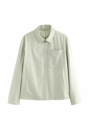 Lys grøn jakke med krave, frontlynlås, enkelt lomme på venstre bryst og sidelommer; lavet af struktureret stof.