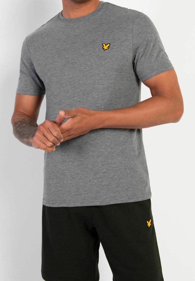 Gray short-sleeve t-shirt made of soft fabric, featuring a small yellow embroidered logo on the chest and round neckline.