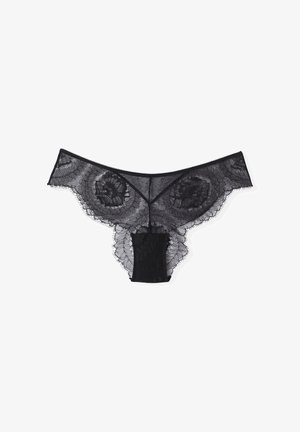 Black lace thong featuring floral patterns with scalloped edges, semi-transparent design, and a solid black center panel.