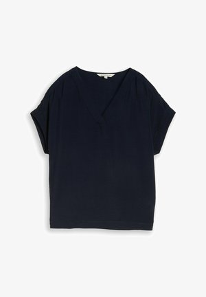 Blouse bleu marine à manches courtes avec col en V et coupe décontractée, avec des détails de couture subtils sur les manches et l'ourlet.