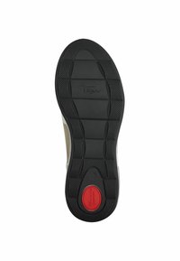 Suola di scarpa in gomma nera con motivo testurizzato, caratterizzata da un accento circolare rosso etichettato "COMFORT" e un design con bordo scanalato.