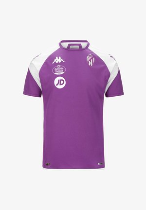 Maillot de sport à manches courtes violet et blanc avec le logo Kappa, les sponsors Estrella Galicia 0.0 et JD, et un écusson rayé sur la poitrine.