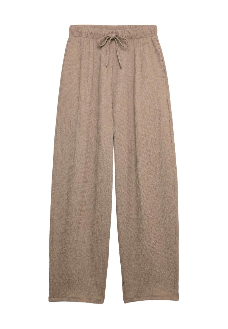 Pantalones de pierna ancha beige, hechos de un material texturizado, con cintura elástica y detalle de cordón, que presentan una silueta holgada y fluida.