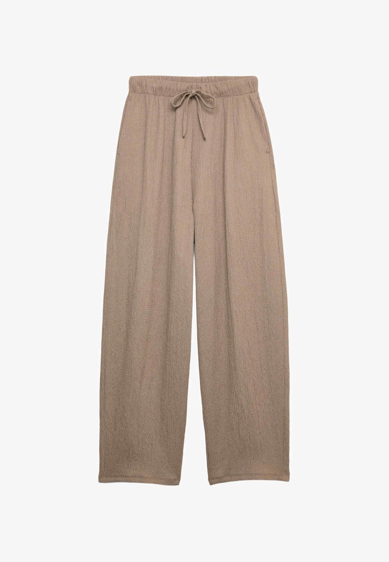 Pantalones de pierna ancha beige, hechos de un material texturizado, con cintura elástica y detalle de cordón, que presentan una silueta holgada y fluida.