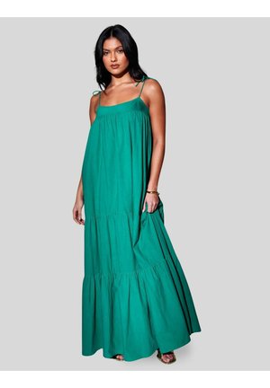 Groene katoenen maxi-jurk met spaghettibandjes, geplooid bovenstuk en gelaagde ruches aan de zoom. Glad oppervlak, vloerlang ontwerp.