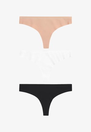 Witte naadloze stringonderbroek met een soepele tailleband en minimale bedekking, afgebeeld tegen een effen witte achtergrond.