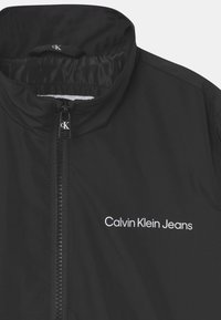 Calvin Klein Jeans Giacca da mezza stagione - black