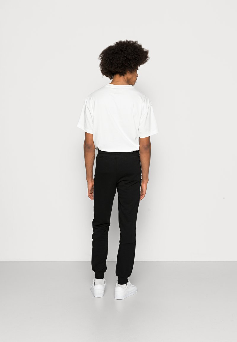 Herren Trainingsanzüge | Jack & Jones JJIGORDON JJTATE PANTS Jogginghose black/schwarz - GQ39741 Herren Trainingsanzüge | Jack & Jones JJIGORDON JJTATE PANTS Jogginghose black/schwarz - GQ39741