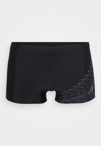 Schwarze Badeshorts aus glattem Material, mit einem eleganten Design und einem Zickzackmuster in Hellgrau an der unteren Seite.