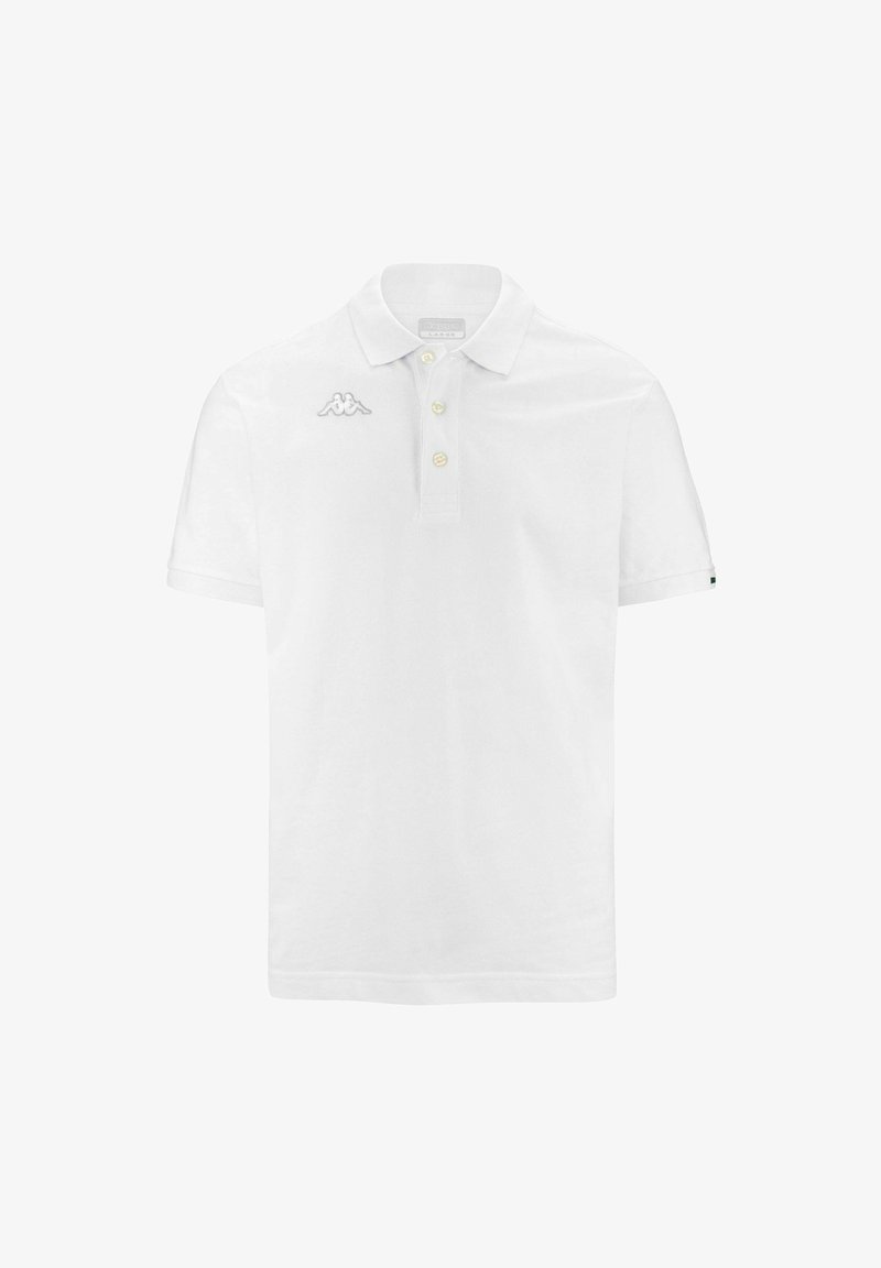 Polo blanc en coton, avec un col classique, un plastron à trois boutons et un petit logo sur la poitrine gauche. Manches courtes.
