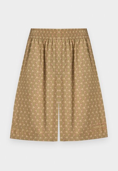 Jupe beige longueur genou avec motif circulaire entrelacé rose, taille élastique, fente centrale et logo "Sandro Paris" près de l'ourlet.