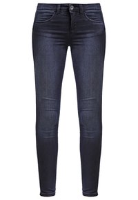 Jeans aderenti blu scuro con una texture liscia, dotati di tasche anteriori, chiusura con zip e un design sfumato discreto lungo le cosce.