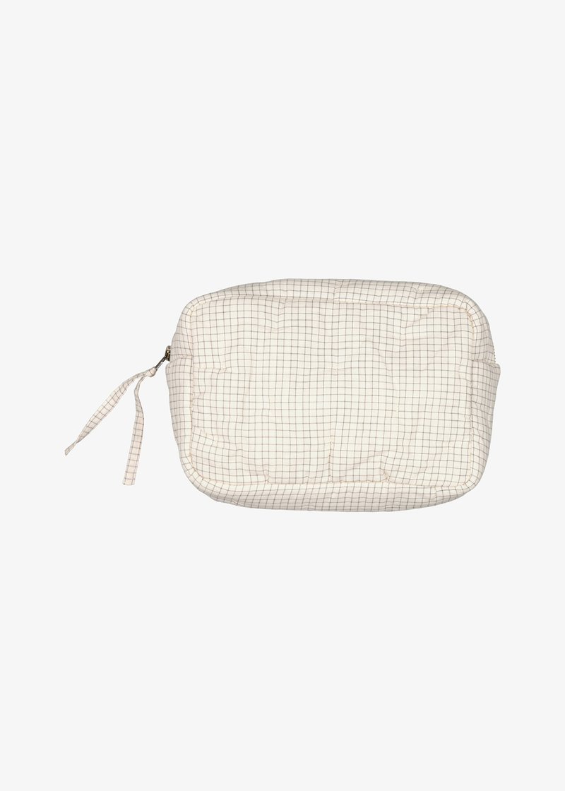 Quilted cream pouch with a grid pattern, featuring a zipper closure and a fabric loop. Soft texture, rectangular shape, and padded design.