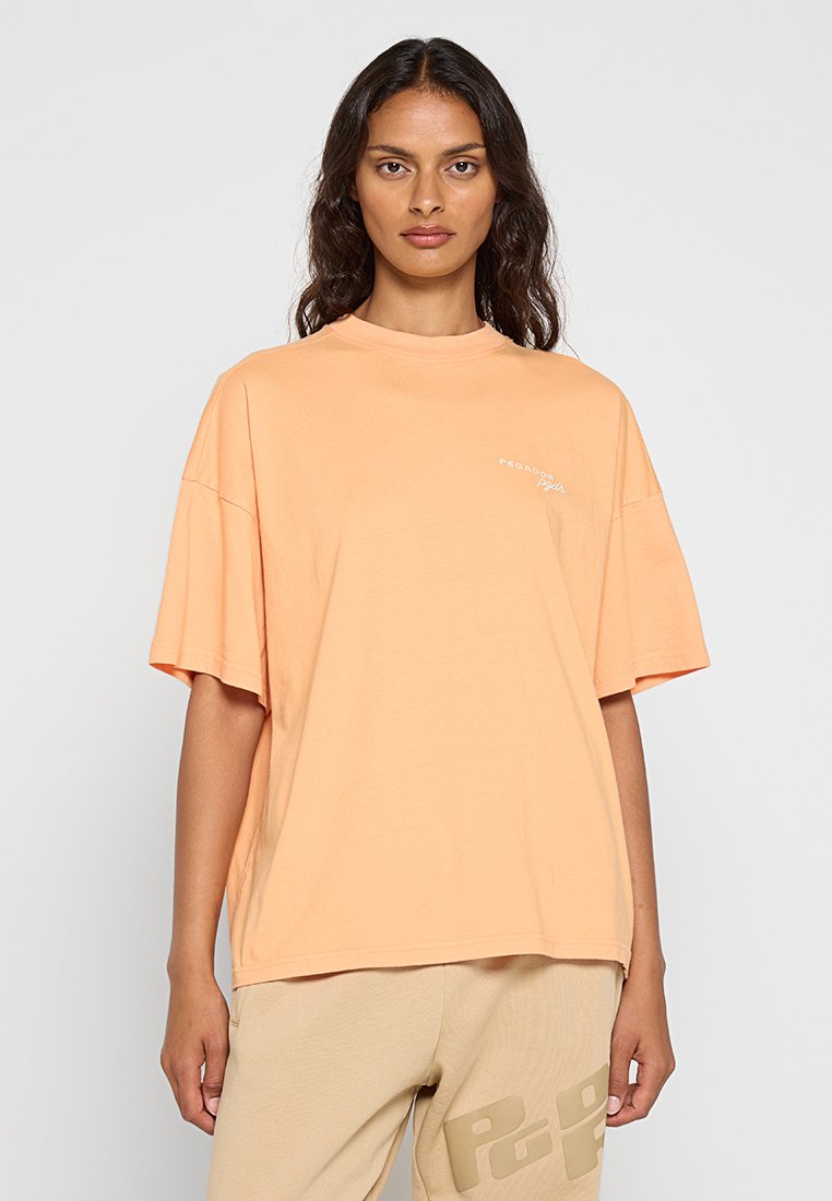 Pegador T-shirt print abrikoos Pegador T-shirt print abrikoos