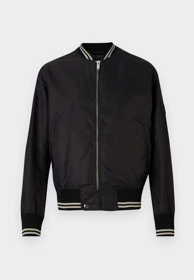 Black bomber jacket featuring a zip front, ribbed collar and cuffs, and striped accents at the cuffs, made from a smooth, lightweight material.