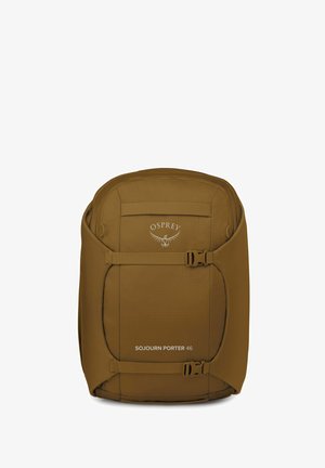 Sac à dos Osprey Sojourn Porter 46 en marron, avec une forme rectangulaire, une texture en tissu, des bretelles ajustables et un logo sur le devant.