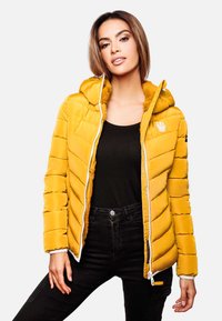 Yellow padded jacket with hood, featuring vertical stitching and faux fur lining. Front zipper closure and embroidered logo on chest.