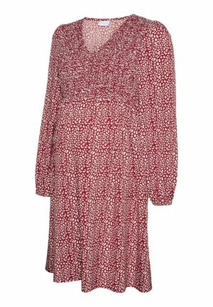 Rode jurk met een V-hals en lange mouwen, voorzien van een wit abstract patroon. De stof heeft een zachte textuur en een losse, vloeiende pasvorm.