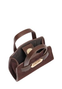 Brown suede handbag with two handles, gold hardware, and a structured design. Interior features a leather strap and an embossed detail.
